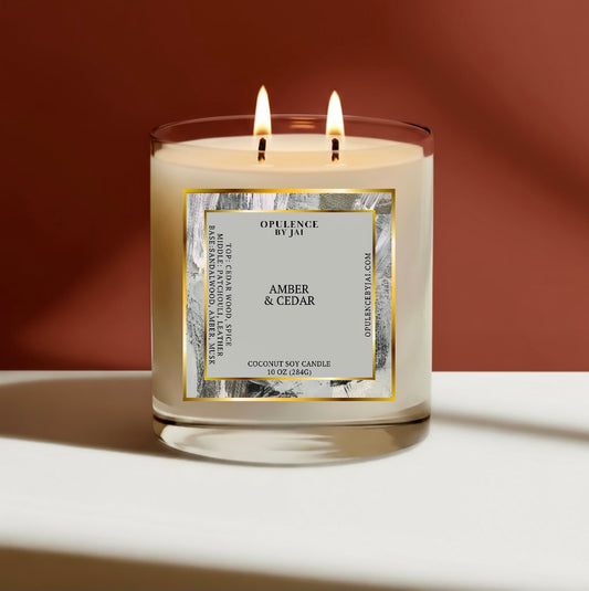 Candle with a label on a white surface and brown background Amber Cedar