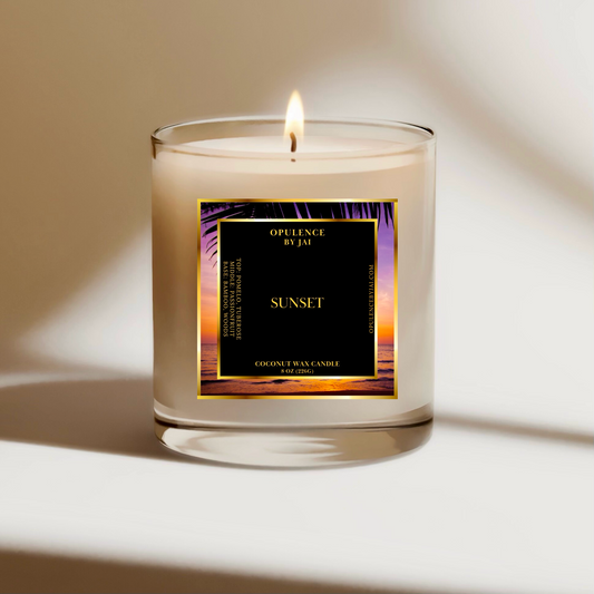 Coconut wax candle with flame and a sunset background on a label